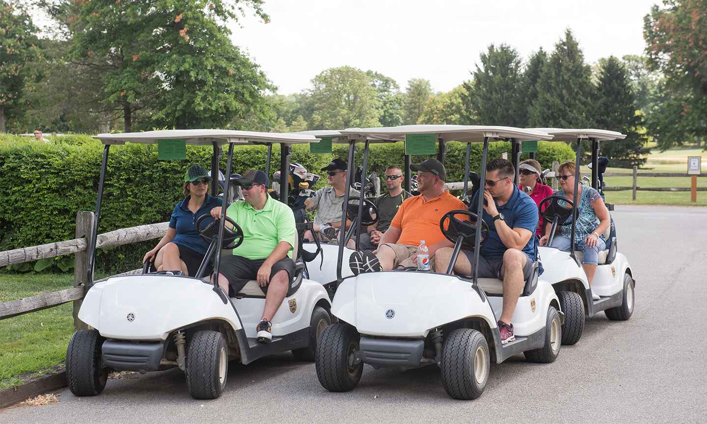 People on golf carts