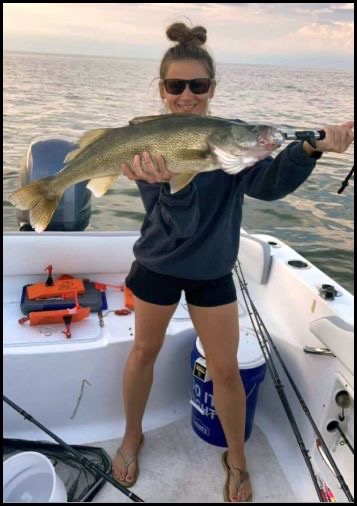 Woman holding a fish