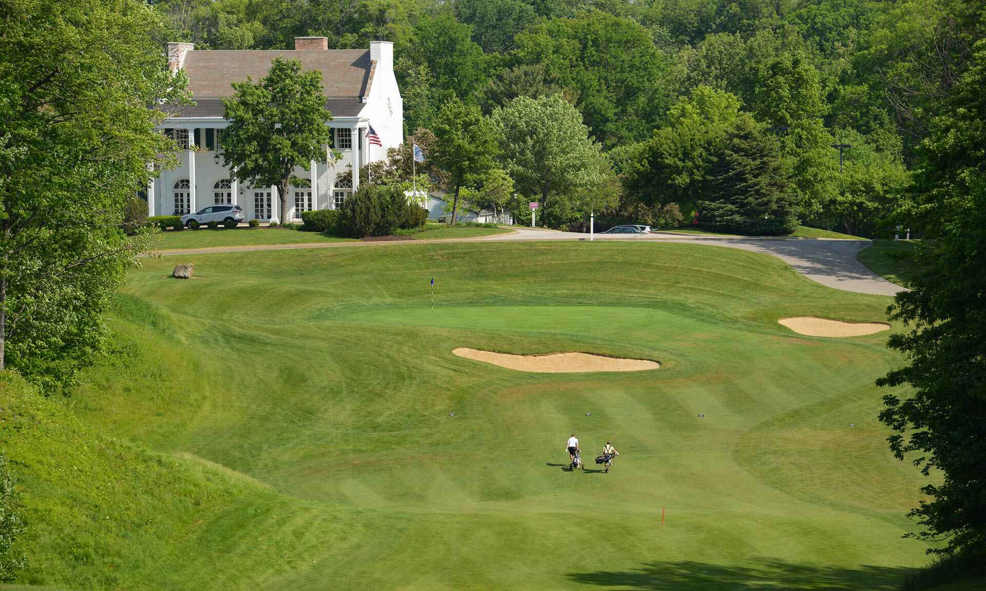 People walking on a golf course