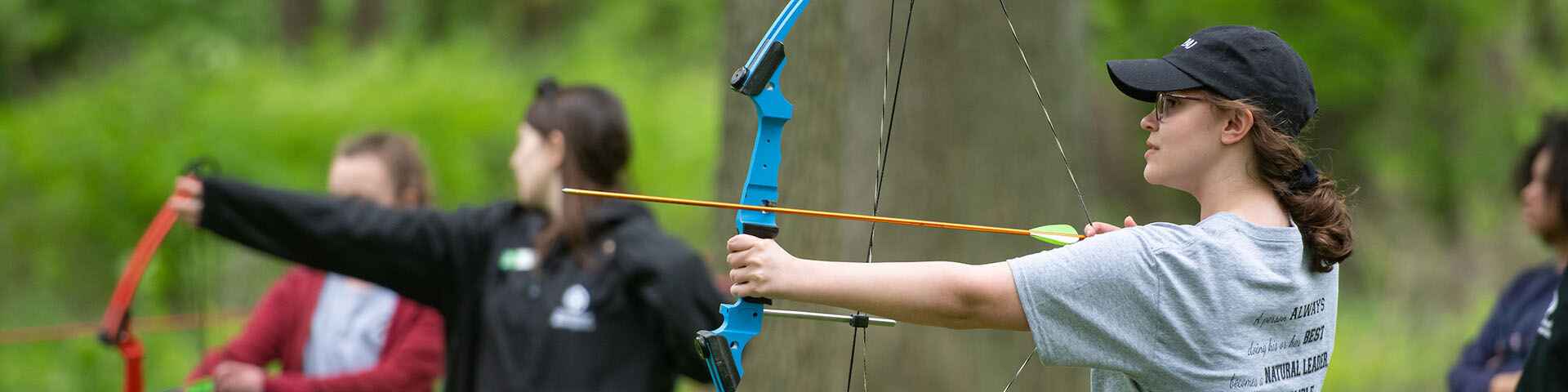 people participating in archery