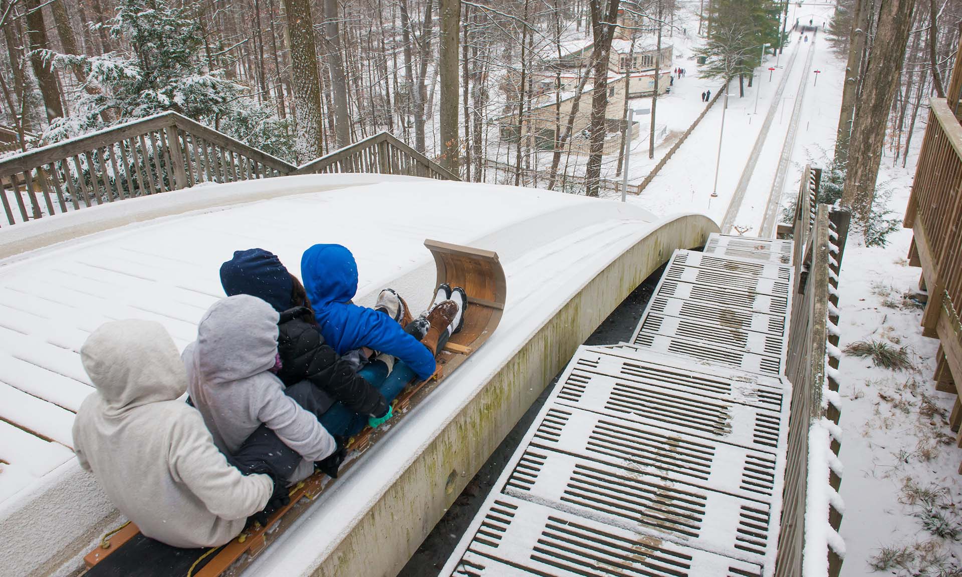 People on a sled in the snow