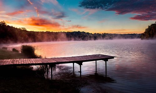 Boardwalk on the lake during sunrise