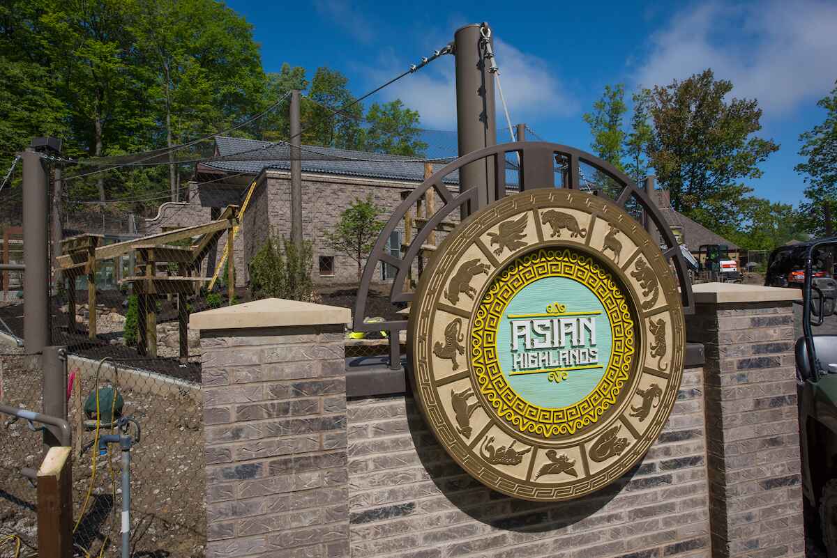 A sign for the Asian highlands area of the zoo